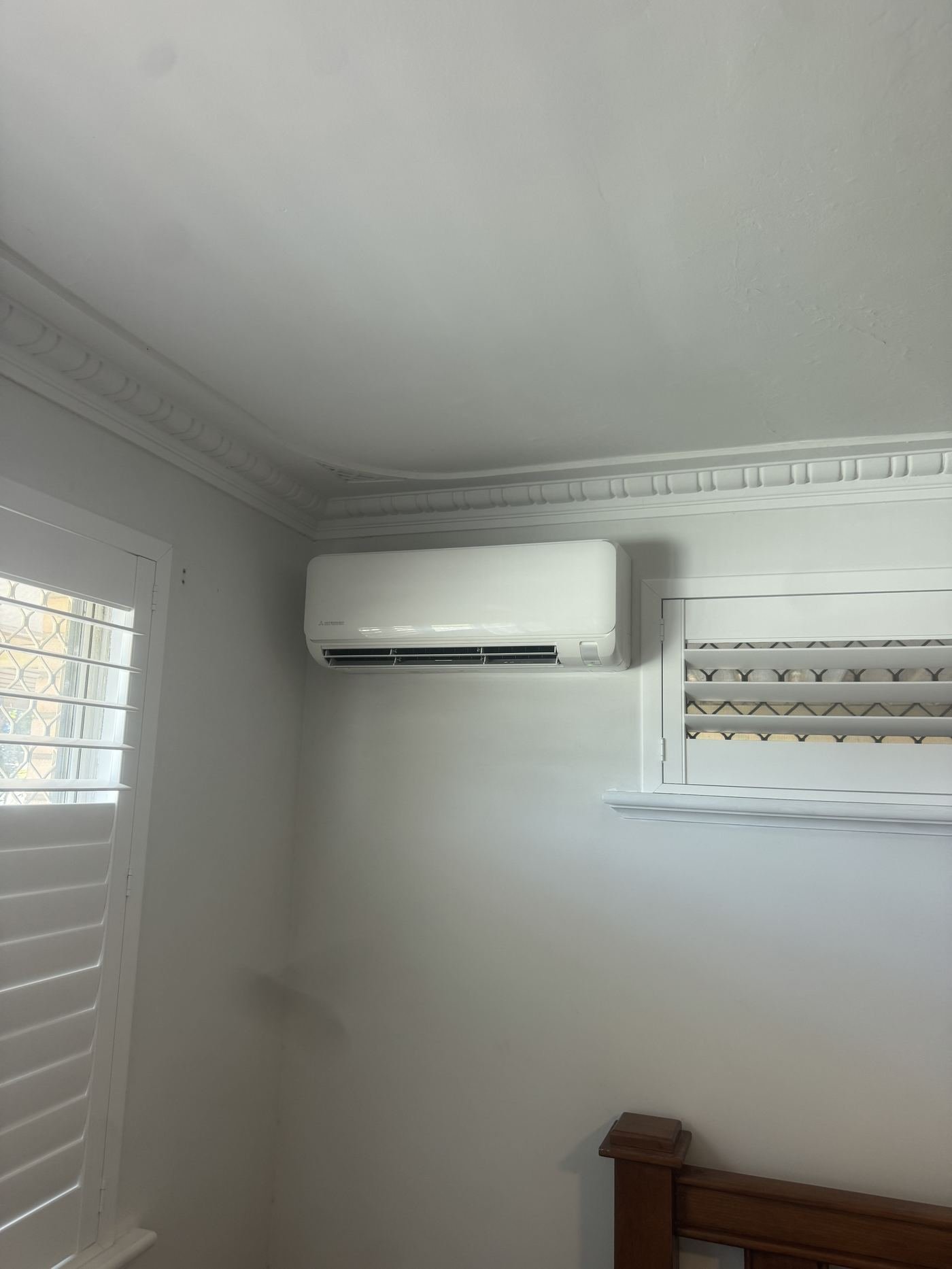 Mitsubishi Electric indoor split-system unit mounted in bedroom